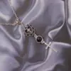 Кулон з ажурним серцем та хрестом
