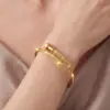 Жорсткий браслет Цвях Золотистий
