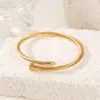 Жорсткий браслет Цвях Золотистий